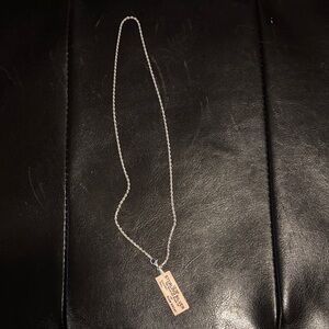 Silver Necklace with Engraved Pendant